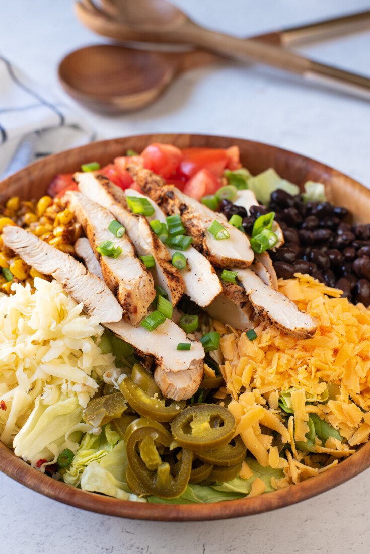 southwestern salad with chicken and green onions.