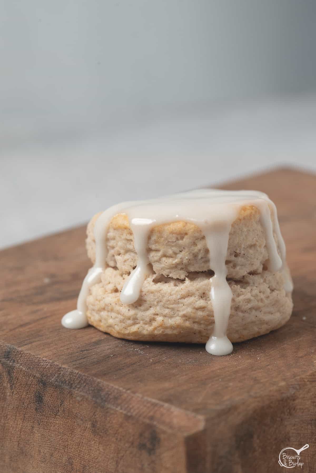 one close up glazed cinnamon flavored biscuit.