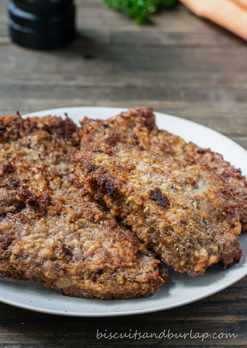 plate with chicken fried steak and no gravy.