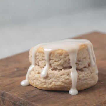 one close up glazed cinnamon flavored biscuit.