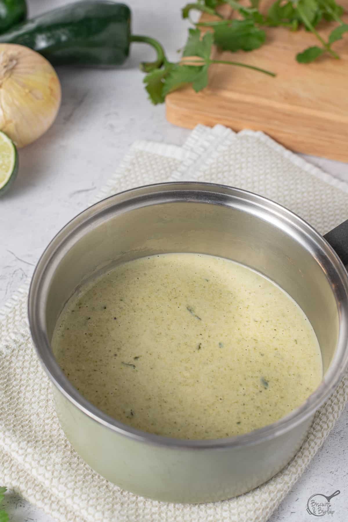 creamy poblano sauce in pot. 