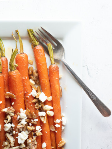 square image of honey glazed carrots.