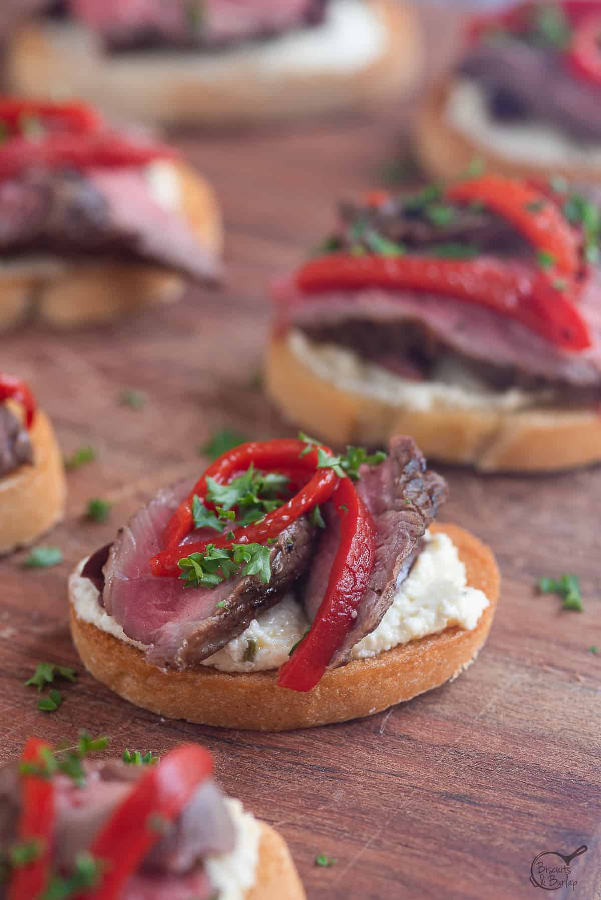 steak crostini on board.