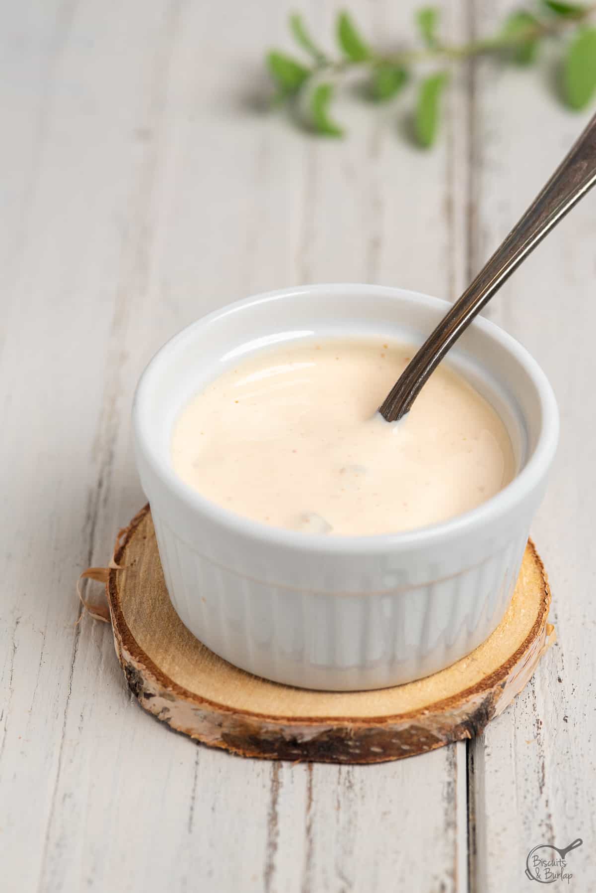 Baja sauce in small white bowl.