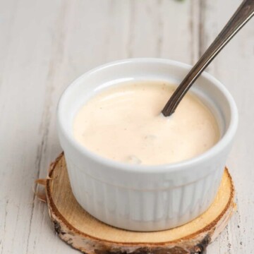 Baja sauce in small white bowl.