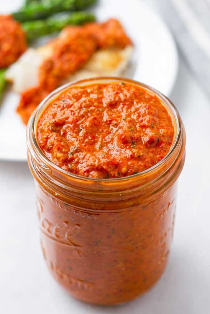 romesco sauce in jar.