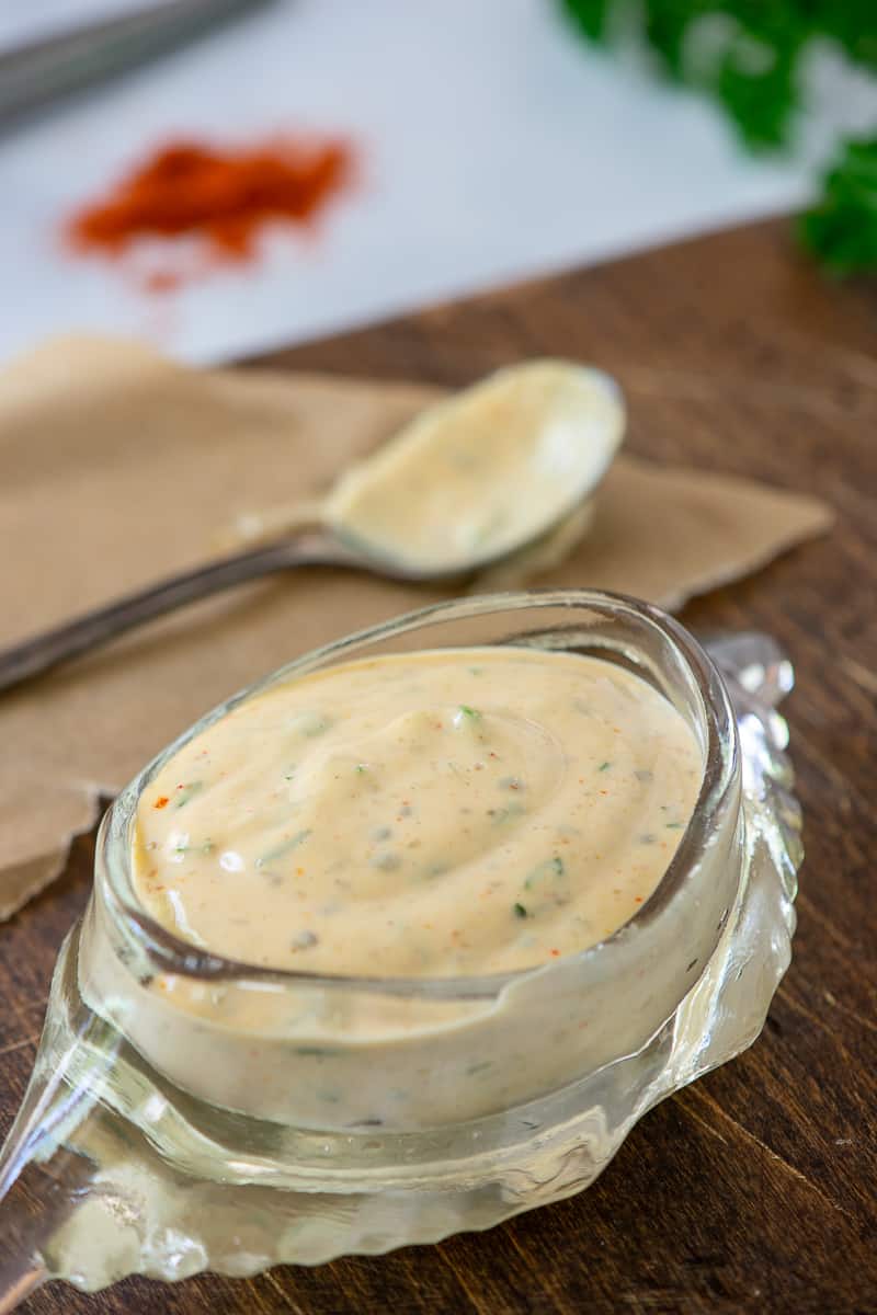 remoulade sauce in glass crab shaped dish. 