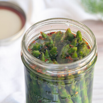 looking into top of jar of quick pickled asparagus.