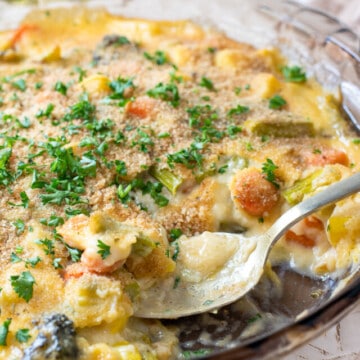 vegetable au gratin with spoon.