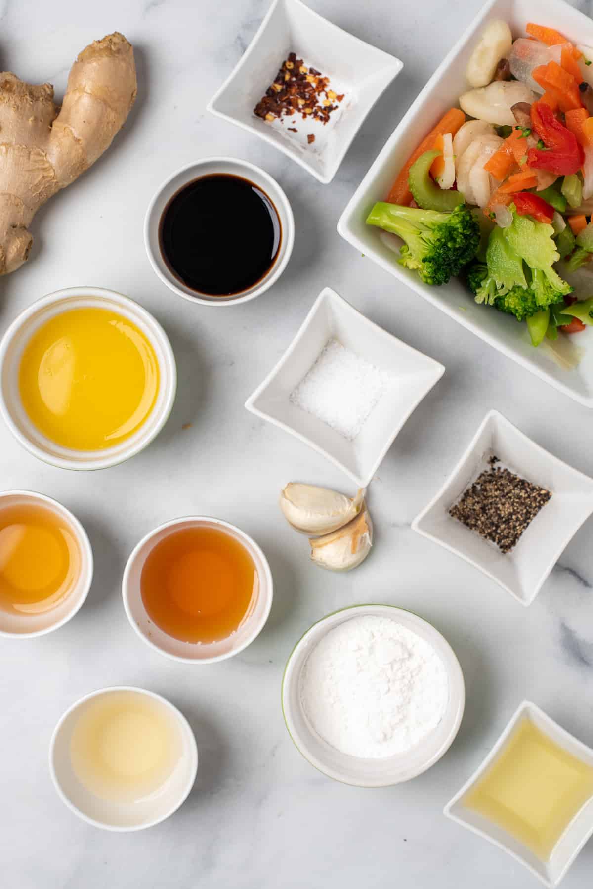 Honey bourbon chicken ingredients on white background