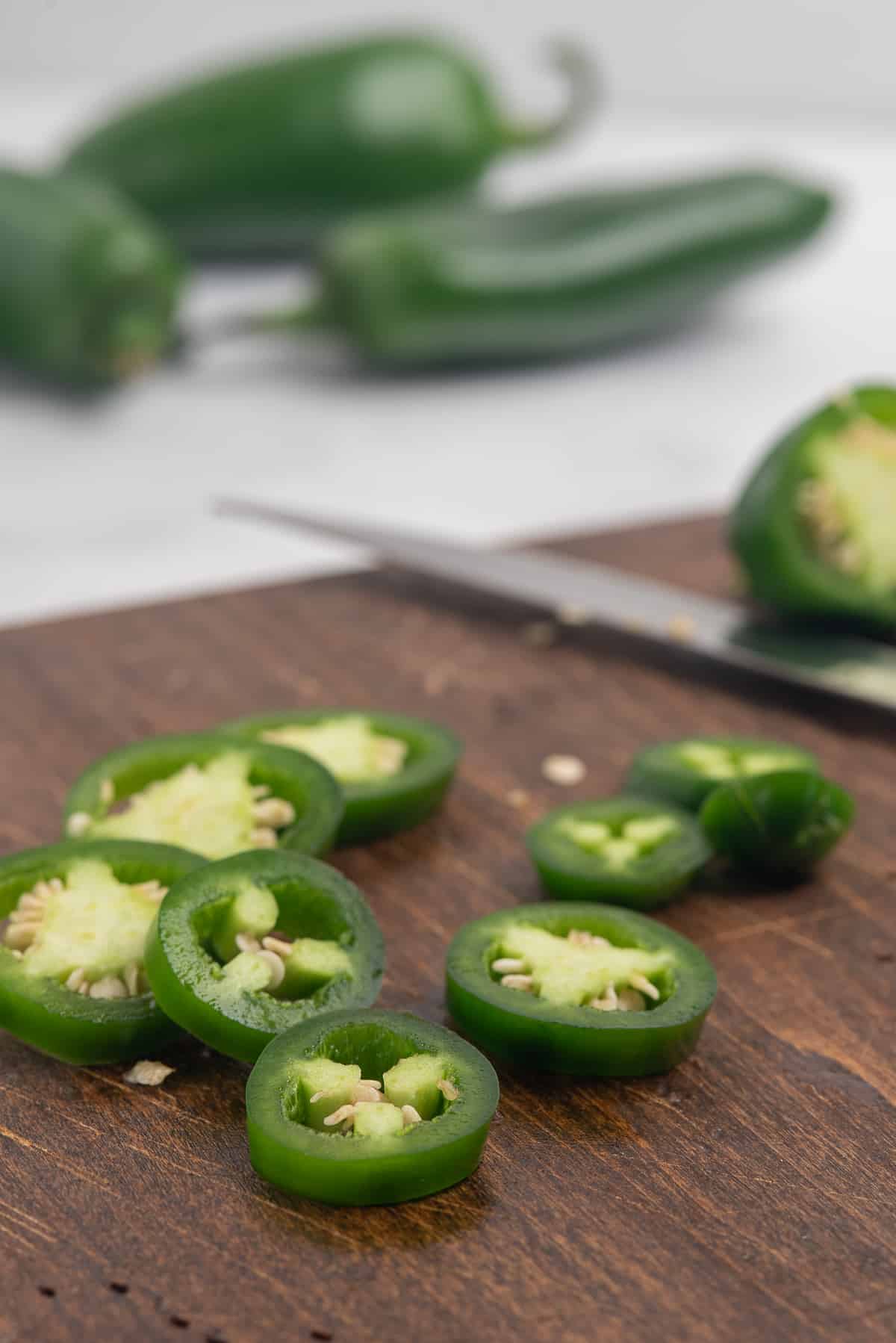 sliced jalapenos on board. 