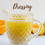 citrus salad dressing in glass pitcher with recipe title in text overlay