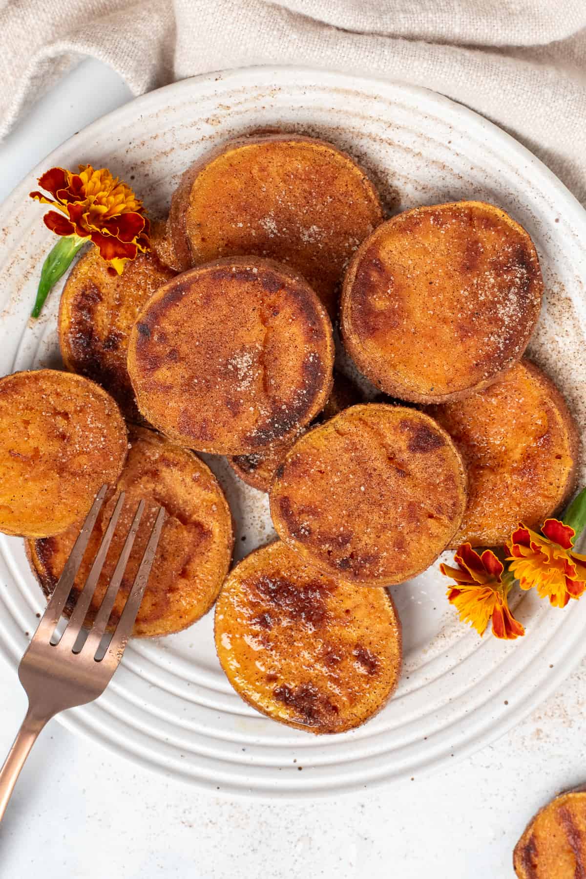 skillet sweet potatoes on a plate. 