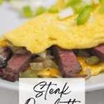 steak omelette with recipe title in text overlay