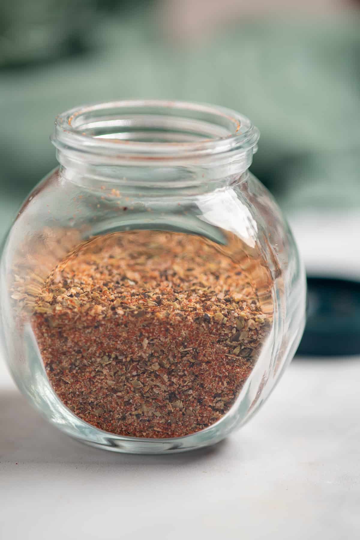 open jar of blackened seasoning. 