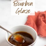 maple bourbon glaze in a white dish with a spoon and the recipe title in a text overlay.
