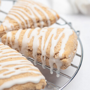 close up of cinnamon scones on rack.