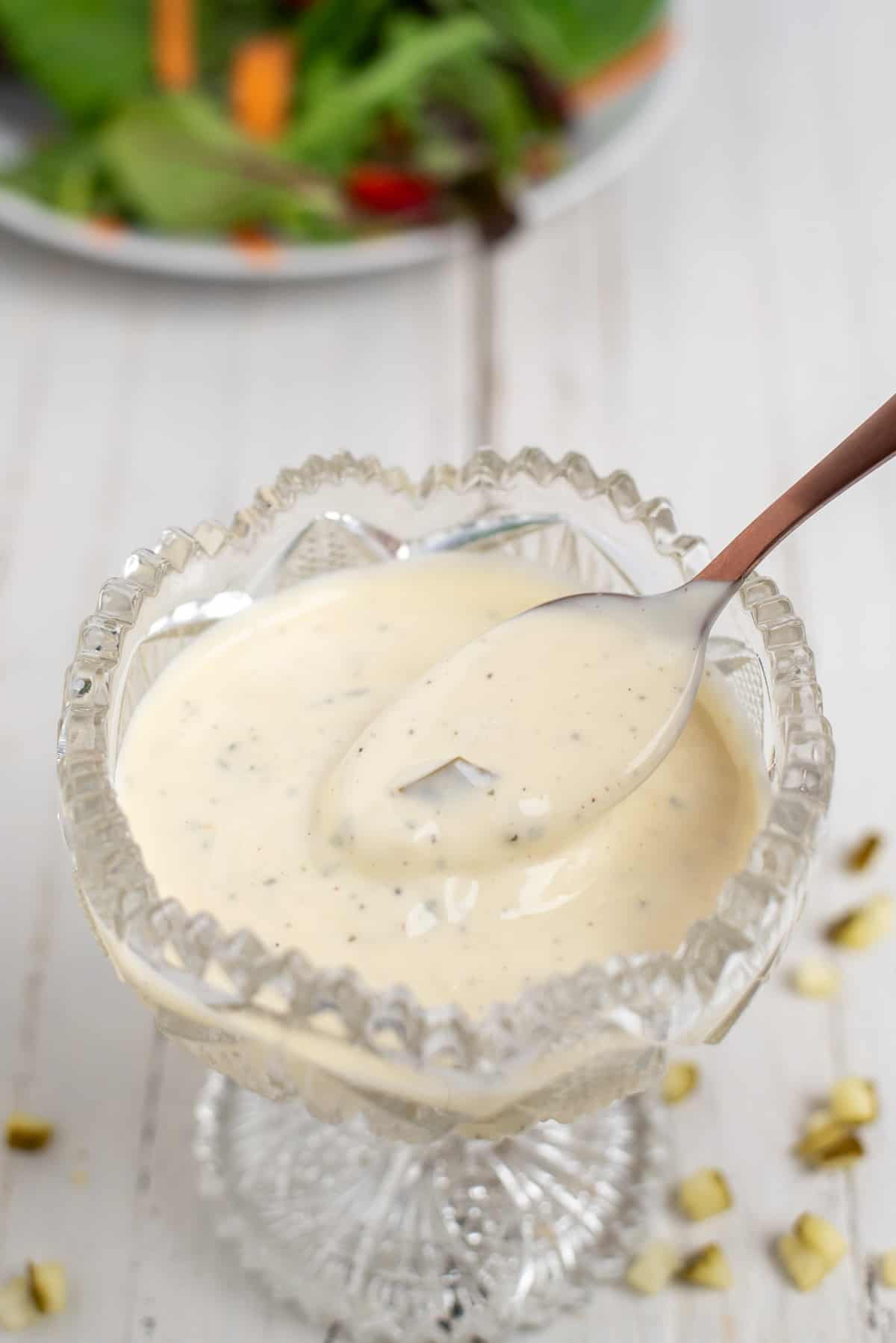 ranch dressing in a glass dish with a spoon