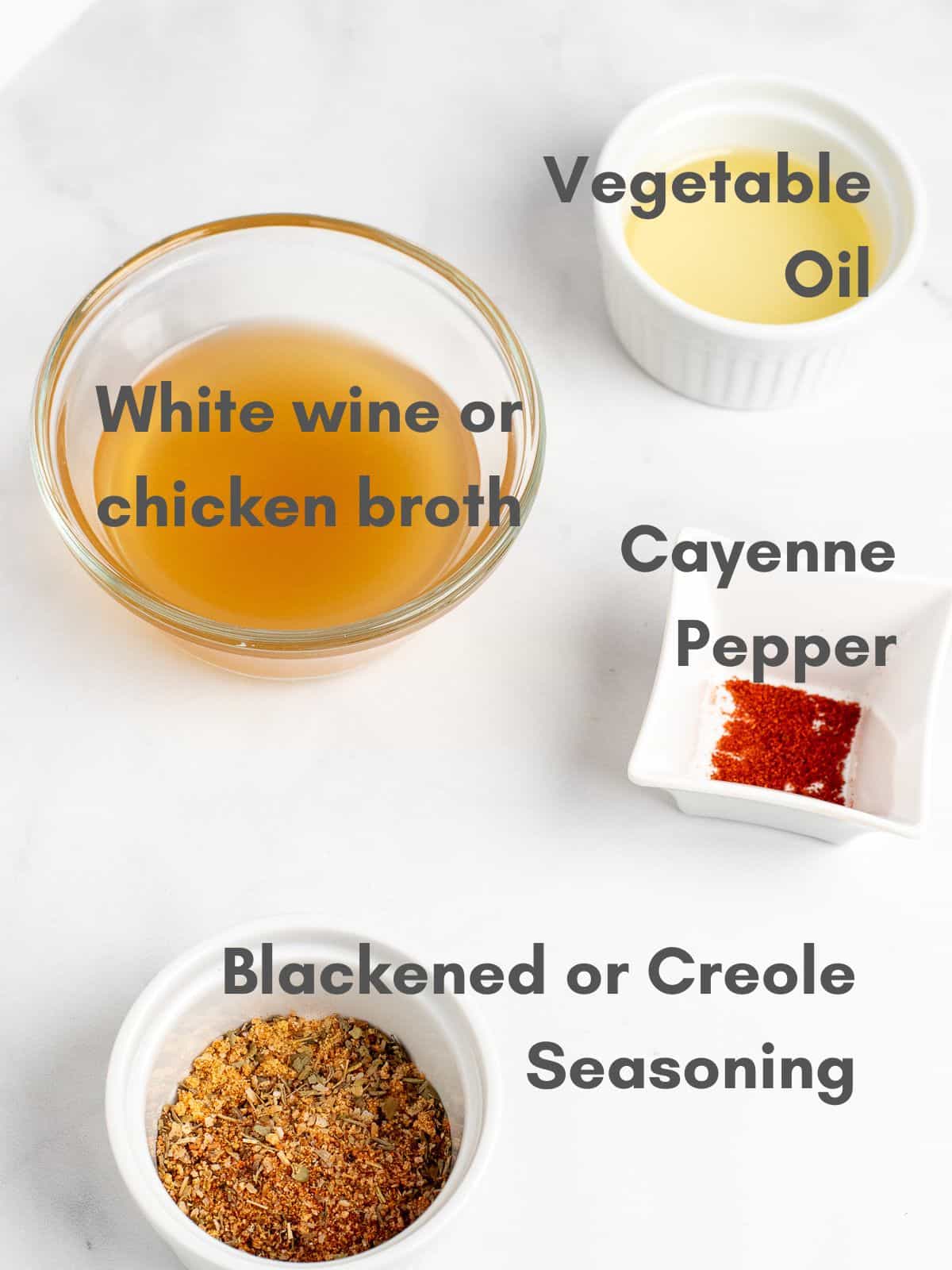 labelled ingredients for spicy chicken tenders and grits. 