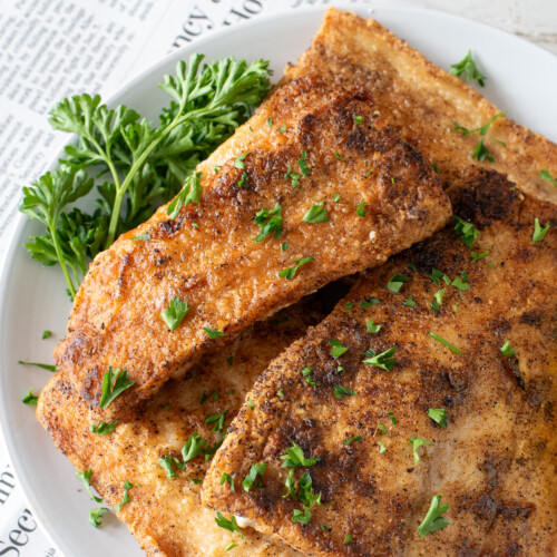 pan fried mahi filets on plate.