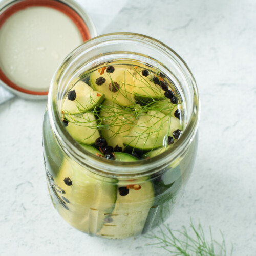 overhead shot of open jar of quick pickles.