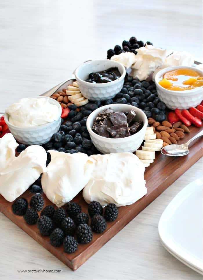 pavlova and toppings on board.