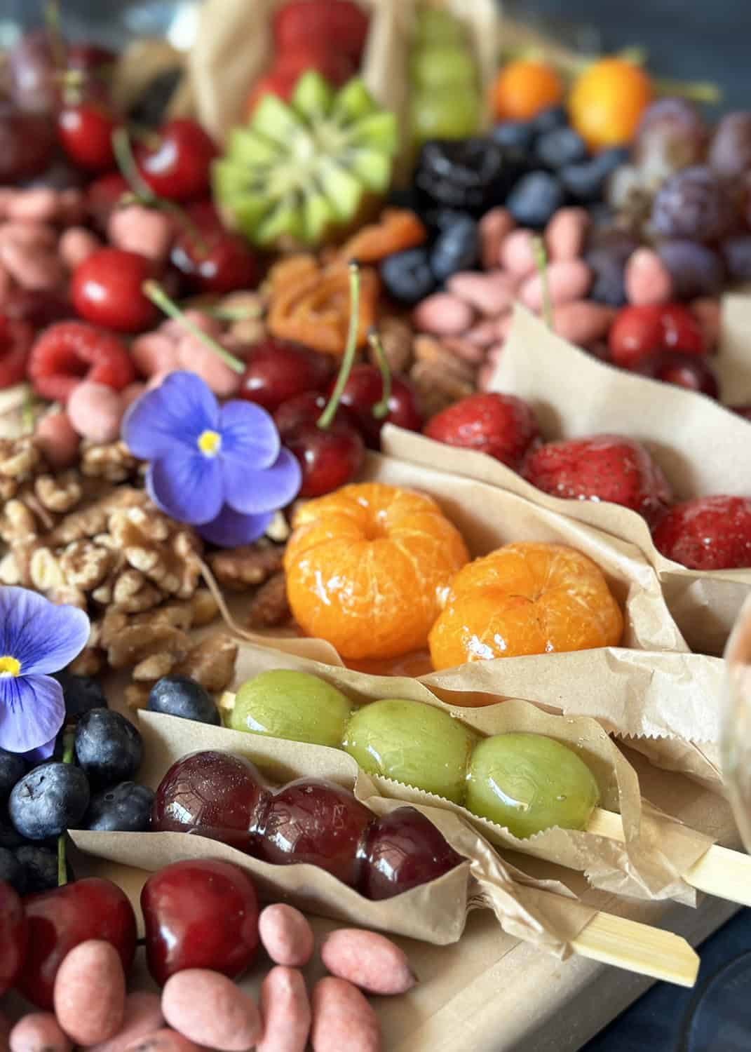 candied fruit arranged on a board.