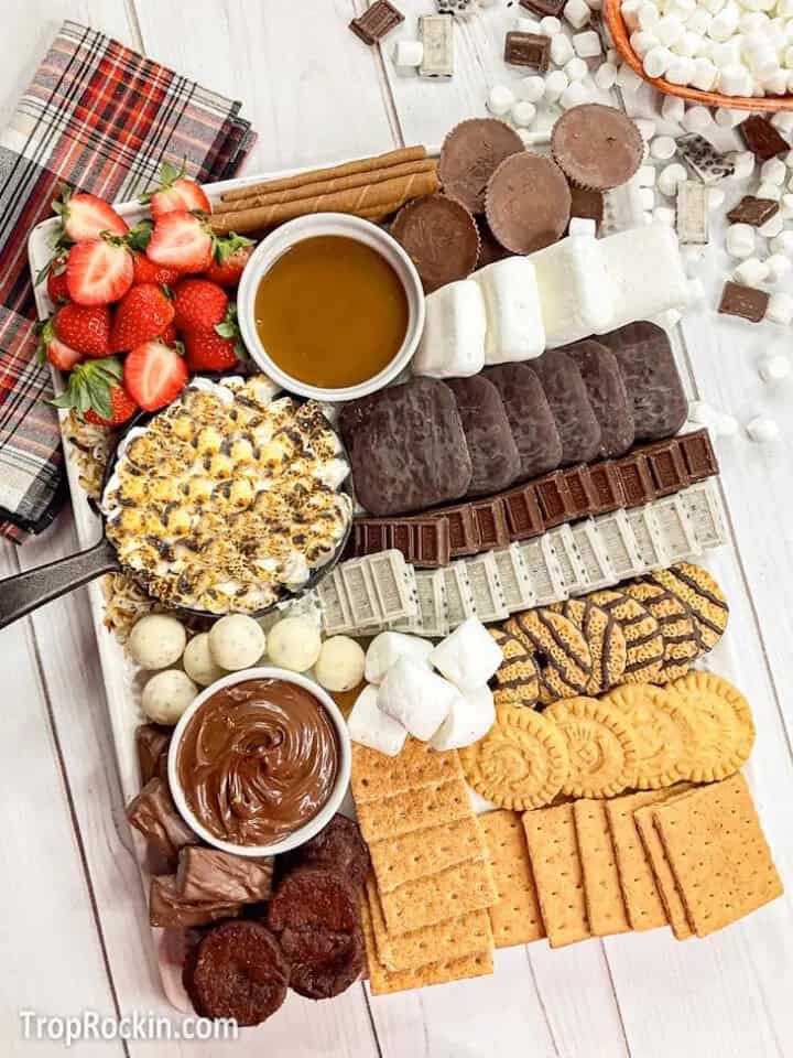 s'mores ingredients on a board.