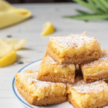 lemon gooey butter cake servings on plate.
