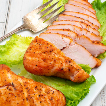 smoked turkey tenderloin on plate.