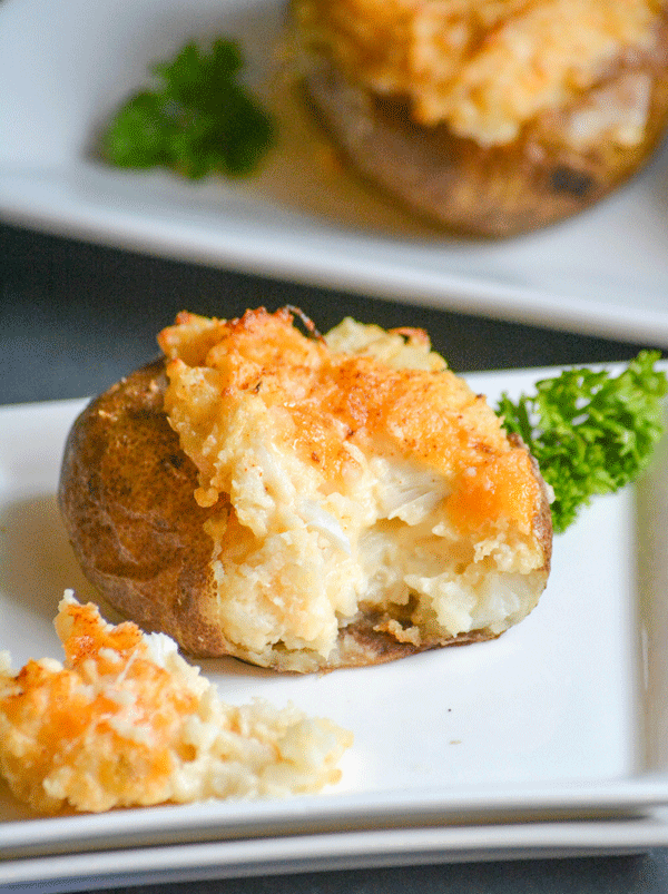 twice baked potatoes are stuffed with lump crab and cheddar cheese