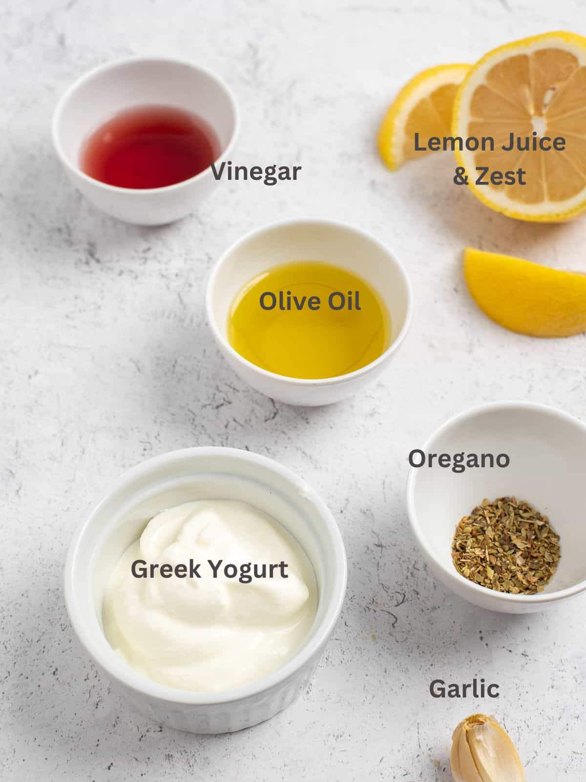 overhead shot of ingredients for greek salad dressing.
