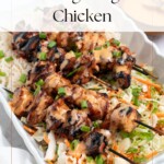 Bang bang chicken on a rice bowl with recipe title in text overlay