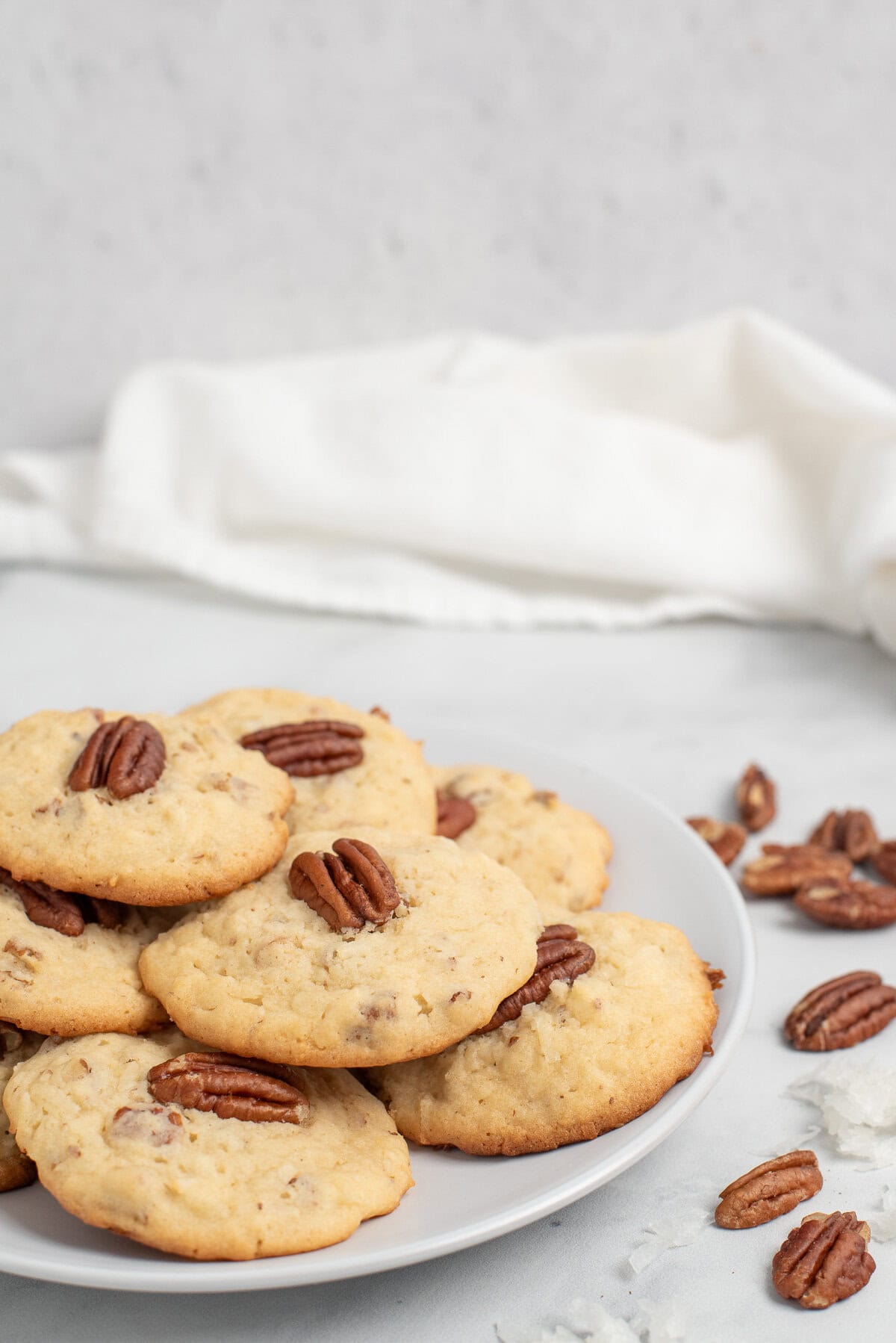 coconut pecan cookies on plate.
