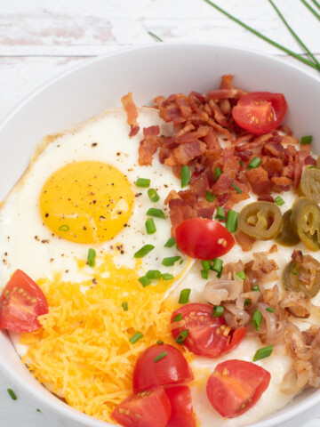 square image of cheesy grits bowls.