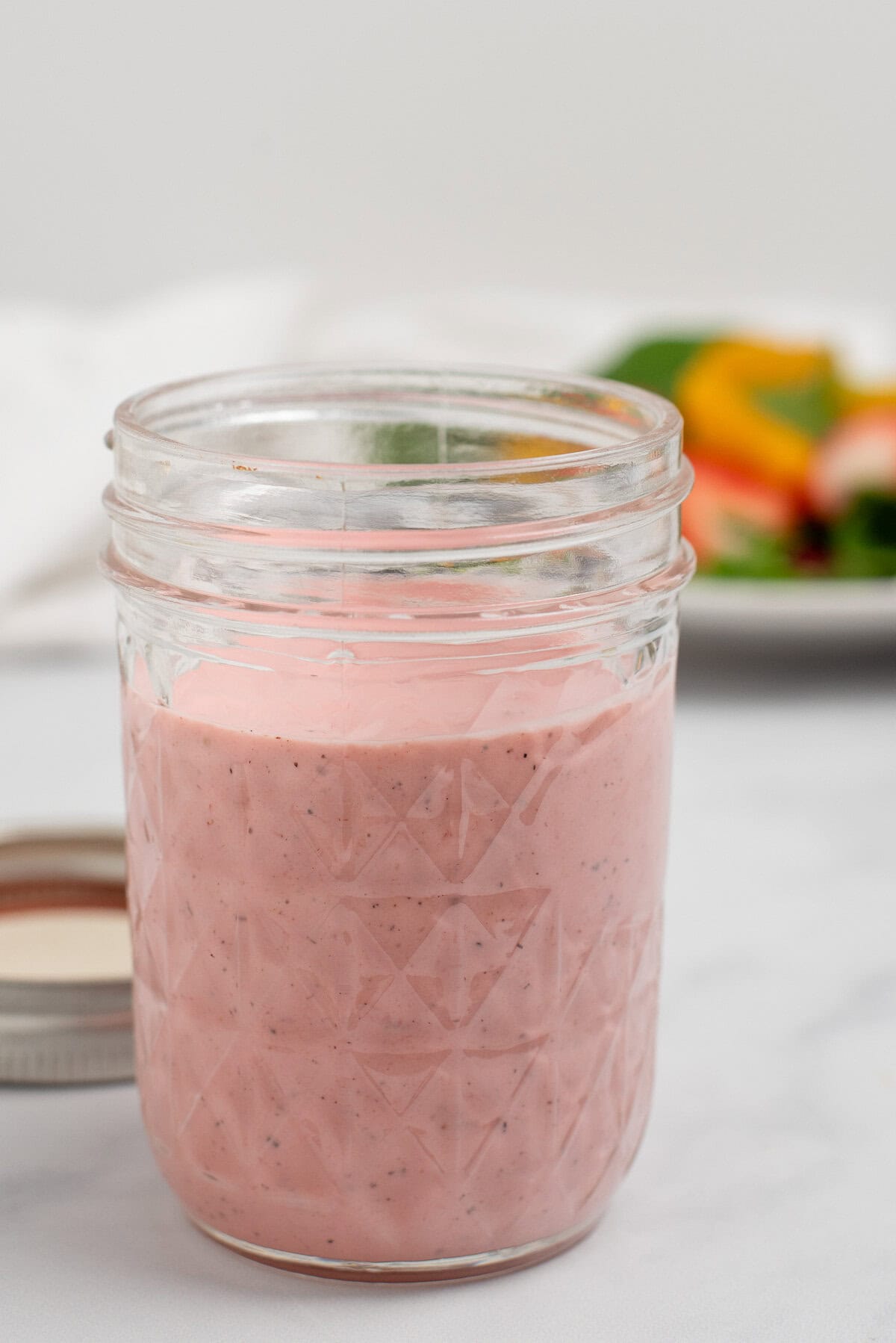 strawberry salad dressing in jar.