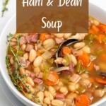 ham and bean soup in a white bowl with the recipe title in a text overlay.