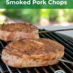 smoked pork chops on grill grate.