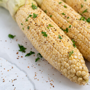close up of smoked corn on the cob.