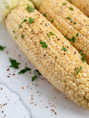 close up of smoked corn on the cob.