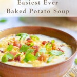 Baked Potato Soup in bowl with toppings.