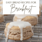 Cinnamon biscuits on a wire rack topped with dripping glaze with text overlay that says "15 easy bread recipes for breakfast."